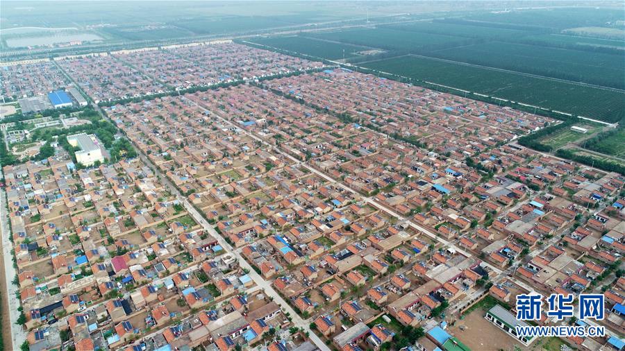 (寧夏60年)(13)荒灘戈壁上構筑移民生態(tài)綠色新家園